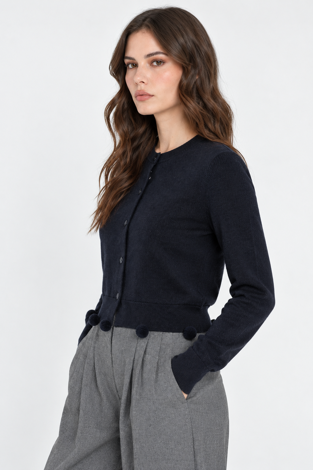 Gilet en tricot à pompons