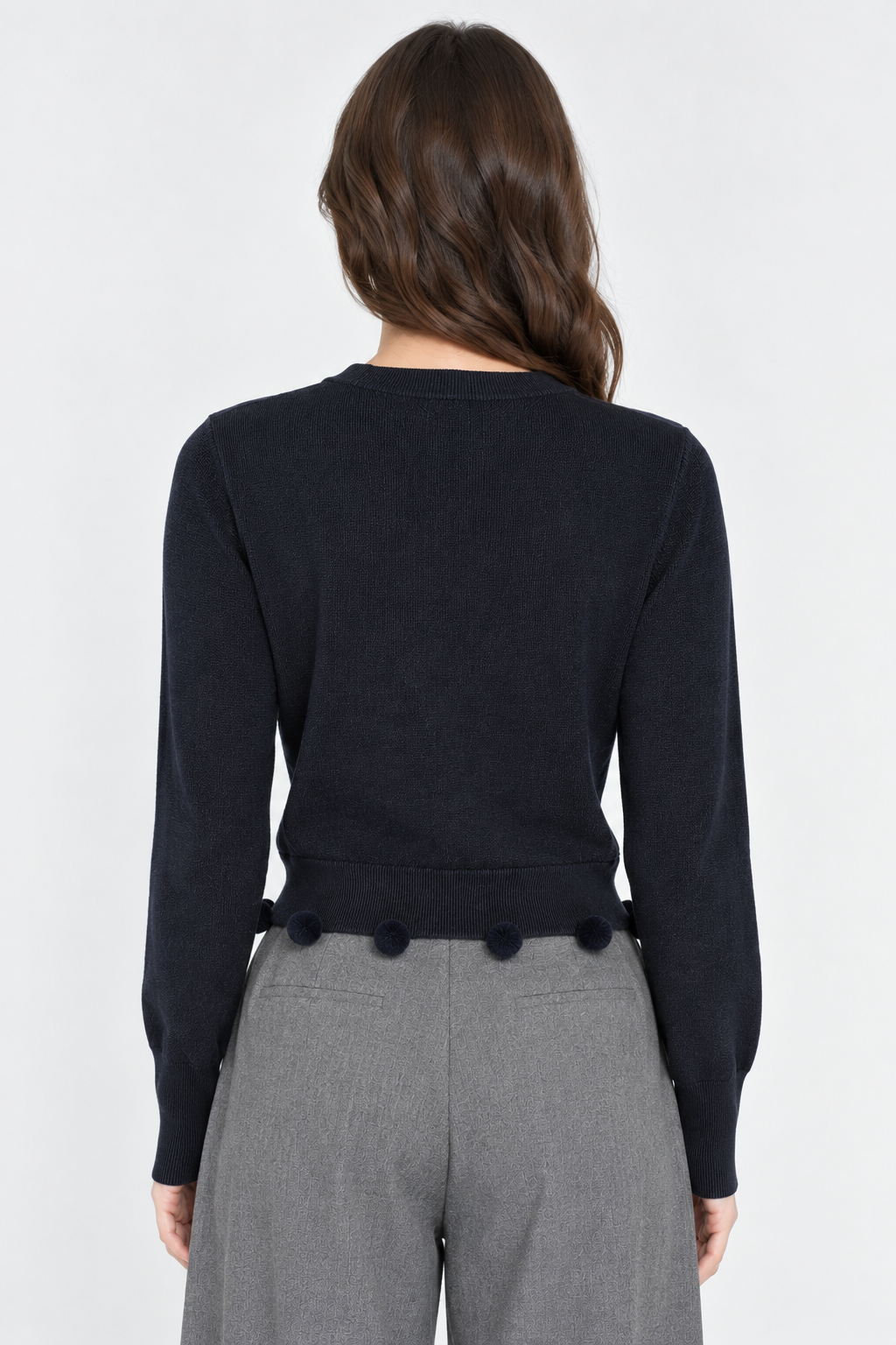 Gilet en tricot à pompons